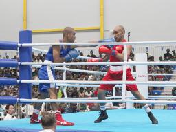  Losifafo Tunoa battling it out with Tongan opponent