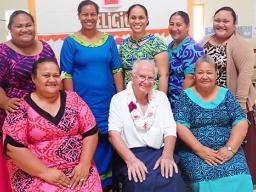 (Standing l-r) Tupu Lualemaga, Imeleta Kelekolio, Faith Afu, Fofo Leo, and Tovale Telesa. (Seated, l-r) principal Maria Telesa, Brother Chris, and Vine Atafua.