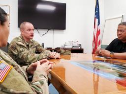 rig. Gen. Timothy Connelly and Command Sgt. Maj. Jessie Baird with Timothy Faumuina
