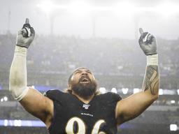 Domata Peko celebrates