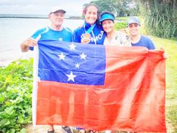 Anne Cairns with her family who joined her in Samoa