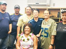 Can plant employees bid farewell to longtime employee Tapaau Fleming (seated) 