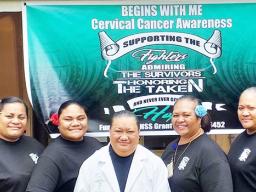 Cervical Cancer Awareness Month banner with LBJ staff standing in front