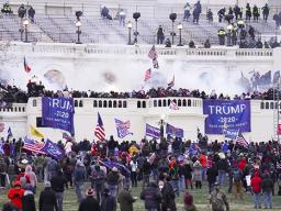 Rioters breaking into U.S. Capitol on Jan. 6, 2021.