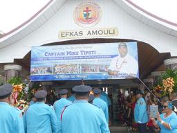 DPS Fire Bureau walk into the Congregational Christian Church of American Samoa in Amouli for a family-service yesterday morning for the late Capt. Mike Asiasiga Olive Tipoti, 
