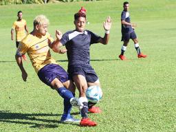 Chris Faamoana (right) of American Samoa and