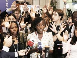 Climate activist Vanessa Nakate, of Uganda with others at cop27