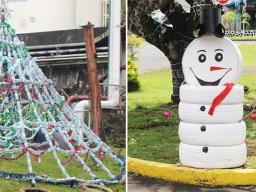 Christmas Tree made of plastic bottles and snowman from painted tires