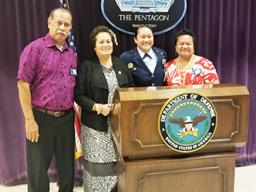 Cong. Aumua Amata congratulates newly promoted Major Mercy Te’o with her parents Su’a Philo and Mrs. Jennings.