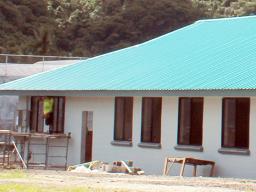Construction workers at the new TAOA building going up in Tafuna.