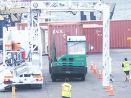 Shipping container in the scanner at Pago Pago harbor