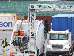 Container at port beside the scanner