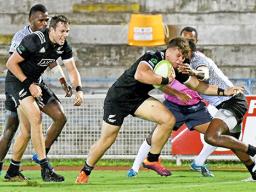 Tim Mikkelson, cheers on young Niko Jones