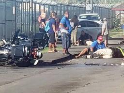 police motorcycle traffic accident with one on the ground