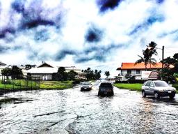 Flooding in front of Cost U Less