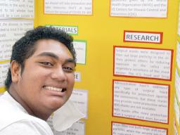 Siitia Mase with his project “COVID-19 & the Effectiveness of Facemask”