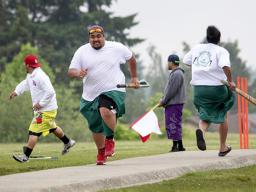 John Reno Sagaga, second from left, passes teammate Onosai Sanerivi 
