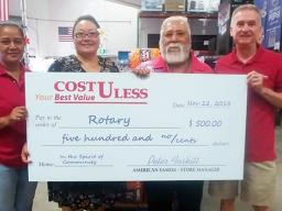 Cost U Less general manager Pete Foskitt with Rotary Club members