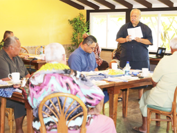 Director of the Political Status office, Dr. Tapa'au Dan Aga with governor and others