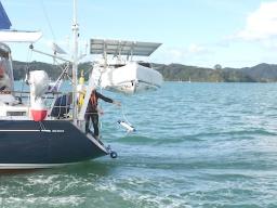 sailor deploying technology for e-DNA, biophysical sensors, and 3-D reconstruction of corals