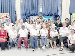 healthcare workforce pose for photo