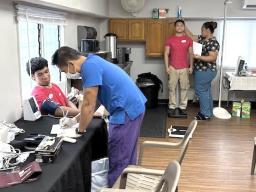 DoH personnel at Ace American Industries