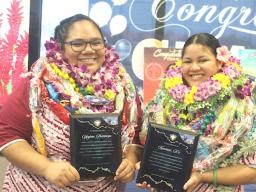 graduates Meghan & Taputailo