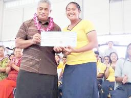 Health Department director Motusa Tuileama Nua (left) accepting donation from Georgina Alofa