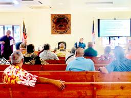 Health director Motusa Tuileama Nua with village mayors