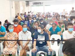 A crowd with masks at DoH