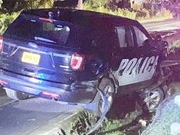 Police unit in ditch