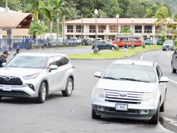 Two police officers stopping vehicles