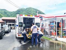 EMS puts body of drawning victim in ambulance