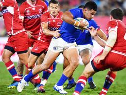 Henry Taefu with the ball