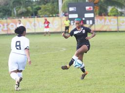 Elcy Lui of Amercan Samoa attempts to control the ball against