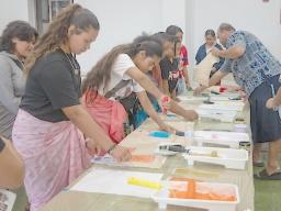 Samoan youth in Hawaii making Elei prints