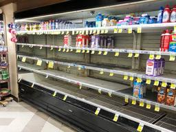 empty shelves in a Eva Beach store, Honolulu 