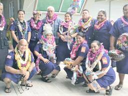 The 11 graduates and EMS head Popo Avegalio