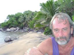 John Enright on the beach at Ofu