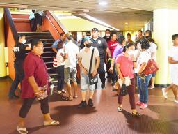 Crowds of people inside the EOB