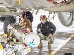 Evan Tu’ua from Maleimi, AS (right), Ryan Ward, center, and Mason Cleveland