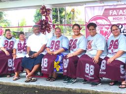 Father Kelemete Puaauli (middle wearing white shirt), surrounded by some of the graduates from Fa’asao High School Class of 1988