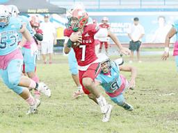 The Vikings quarterback scrambling out of the pocket