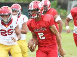 Faga’itua Vikings quarterback Fitu Amata Jr. breaking