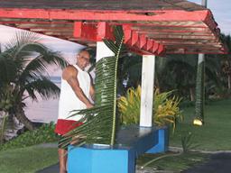 amoa Environmental Protection Agency employee decorating for a scaled-down Flag Day celebration
