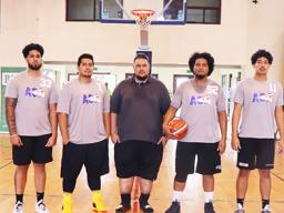 Pictured are: Jeremiah Tuimaseve (#7); Lynel Steve Siu (#11); Paul Iese Collins (#12); Afimuao Nimoa'i (#14); Michael Su'euga Pa'aga (#22); Lyle Pene Penani Siu (#33); Onosaiilemeatiga Tovale (#52); and head coach Diehl Michael Angelo Langkilde.