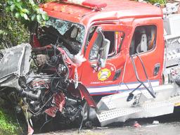 Close up of totaled front end on firetruck that crashed on Afono Road