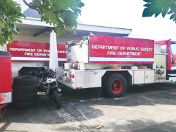 Two firetrucks awaiting parts