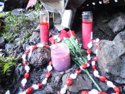 Flowers and candles were placed at the scene where two firefighters were killed