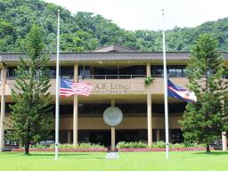 U.S. and American Samoa flags outside the ASG Executive Office Building